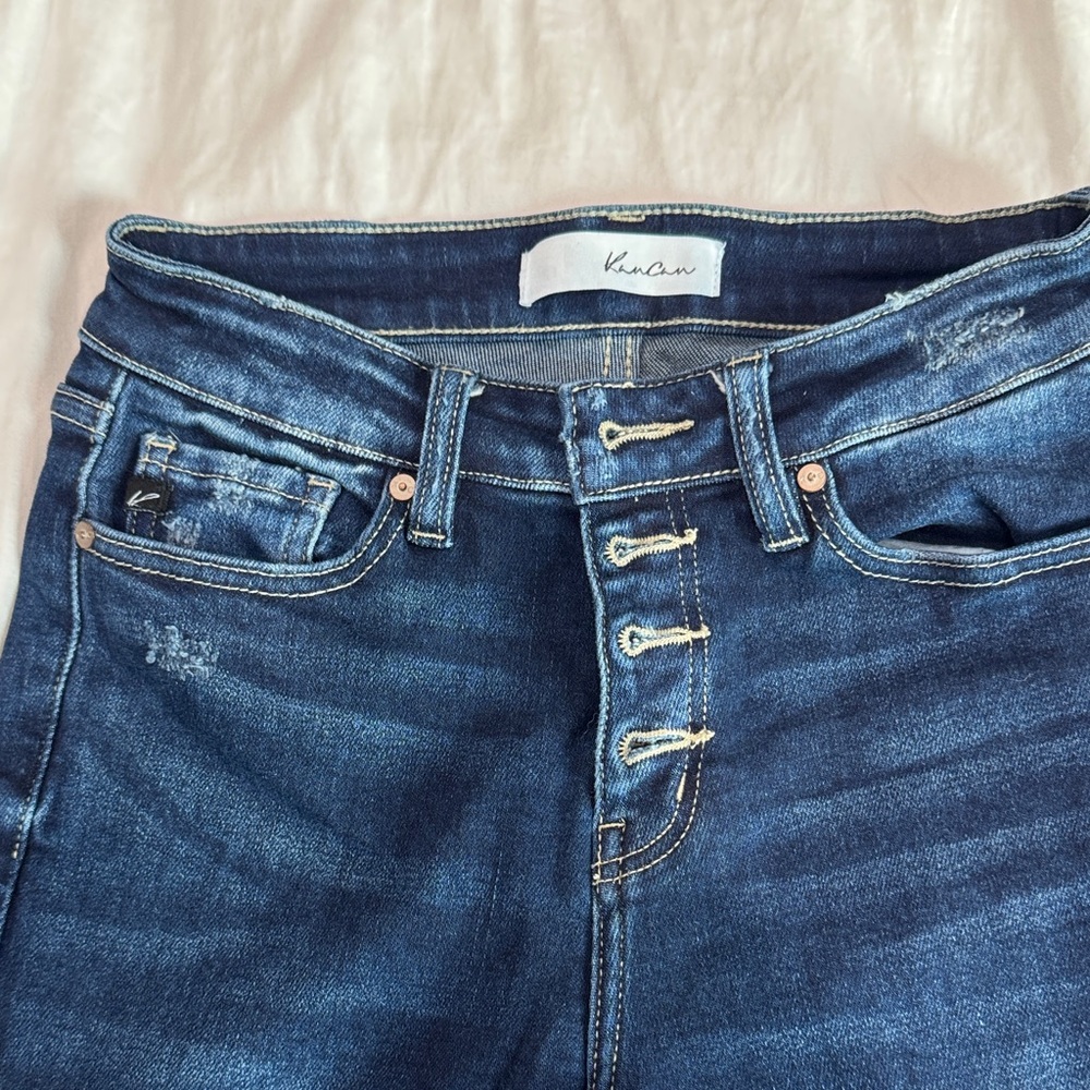 Kancan high rise, flare, distressed, bottom button butterfly size 27 dark wash